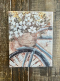 Bicycle with floral basket canvas art print