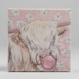 Whimsical cow blowing bubble, Highland canvas art print