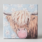Highland cow blowing bubble canvas art print