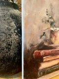 Teacup atop vintage books canvas art print