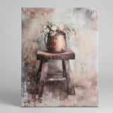 Florals in a copper pot on an old wooden stool