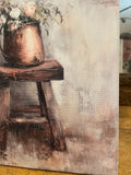 Florals in a copper pot on an old wooden stool