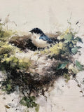Bluebird perched in a nest canvas art print