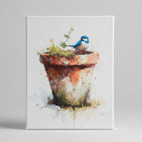 Bluebird perched on a clay pot canvas art print