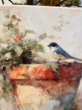 Bluebird perched on a clay pot canvas art print