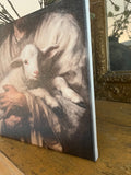 Jesus holding a lamb canvas art print