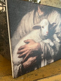 Jesus holding a lamb canvas art print