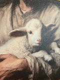 Jesus holding a lamb canvas art print