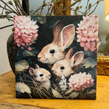 Bunnies in pink flowers