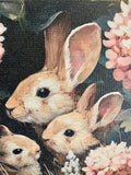 Bunnies in pink flowers
