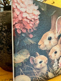 Bunnies in pink flowers