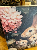 Bunnies in pink flowers