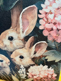 Bunnies in pink flowers