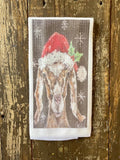 front view brown and white goat wearing santa hat hand towel