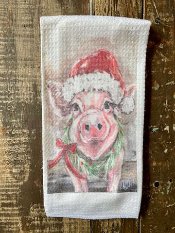 front view pink pig wearing santa hat and christmas wreath hand towel