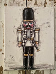 canvas of white and black christmas nutcracker