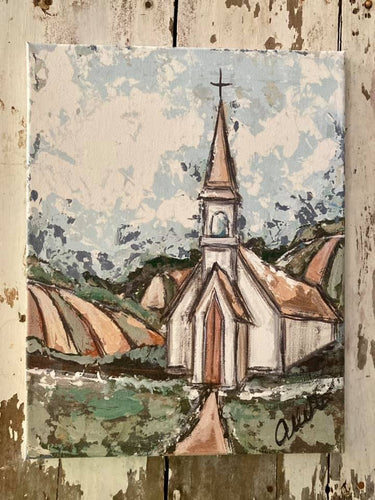 white and brown church on farm canvas